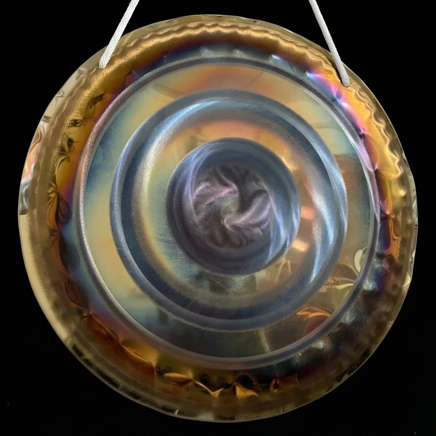 50 cm handheld gong with a golden rim and a hand-hammered violet spiral at the centre