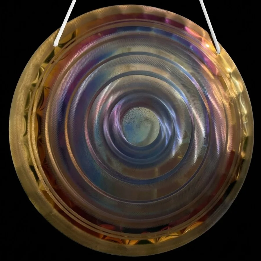 50 cm stainless steel gong in violet and gold heat colours around a hammered spiral centre